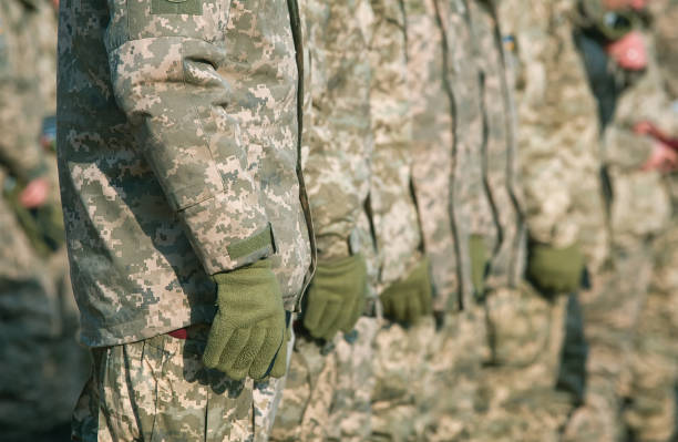 istock Army parade, military uniform soldier row march 1199221591