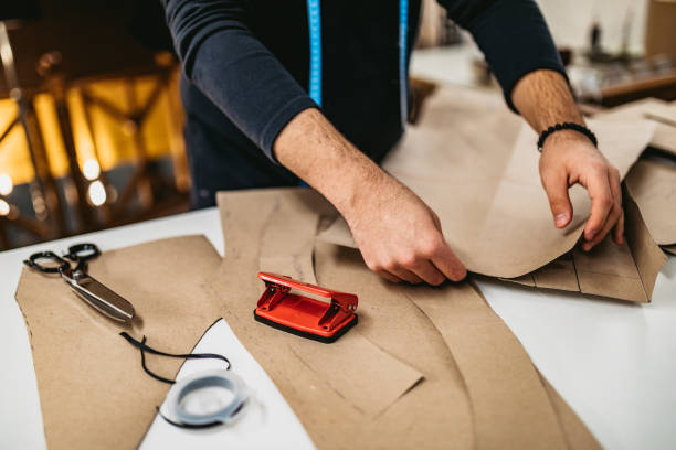 istock Fashion designer working in atelier 1199221983