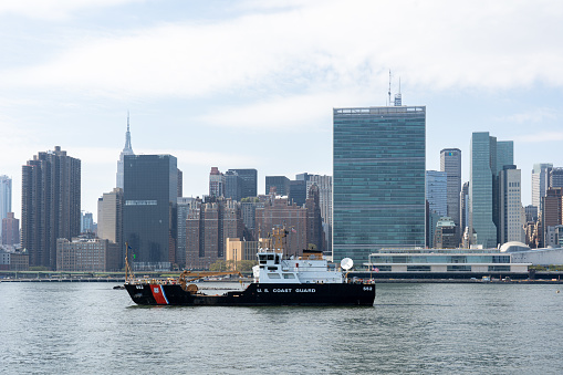New York, United States of America - September 23, 2019: The U.S. Coast Guard boat Katherine Walker in front of the United Nations headquarters.