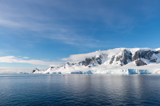 istock Antarctic landscape with iceberg at sea 1199229156