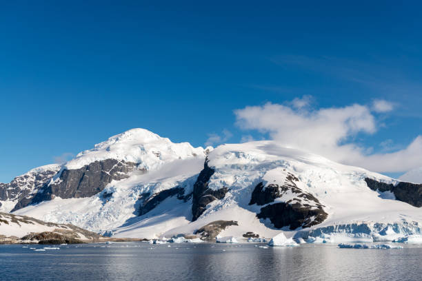 istock Antarctic landscape with iceberg at sea 1199229258