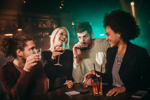 istock Diverse millennials on a cocktail night 1199229524