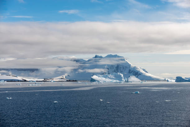 istock Antarctic landscape with iceberg at sea 1199229530
