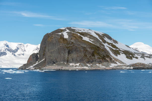 istock Antarctic landscape with iceberg at sea 1199229700