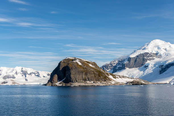 istock Antarctic landscape with iceberg at sea 1199229918