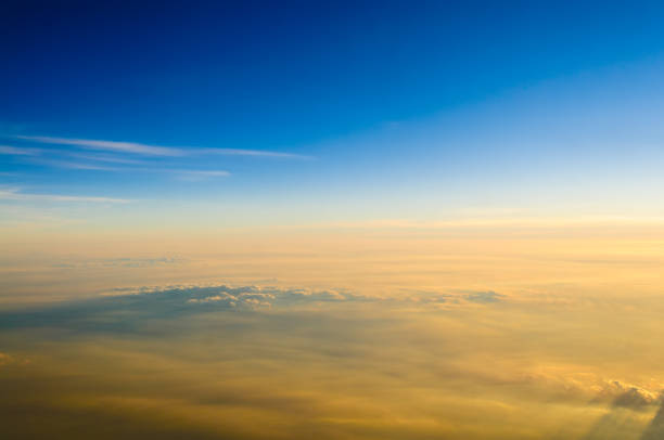 sky and clouds sunset time stratosphere nature abstract background - cloud cloudscape stratosphere above imagens e fotografias de stock