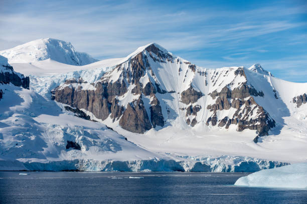 istock Antarctic landscape with iceberg at sea 1199230233