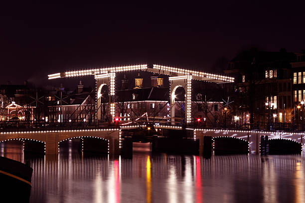istock Thiny bridge by night in Amsterdam the Netherlands 119923077