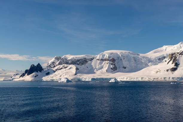 istock Antarctic landscape with iceberg at sea 1199230983