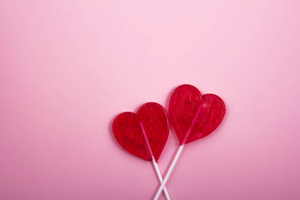 istock Love gift box and heart candy stick. 1199231096