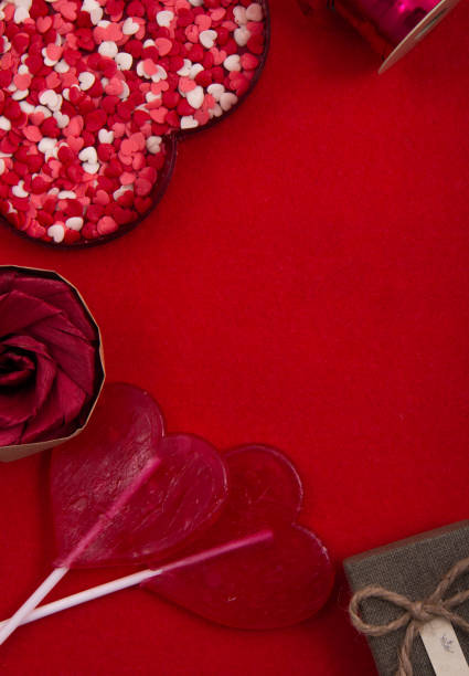 istock Shiny red and silver balloons, rose flowers and gift boxes. 1199231202
