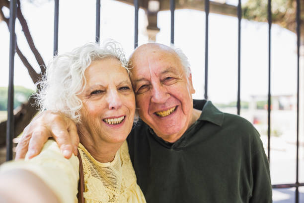 istock Senior couple, tourists taking a selfie 1199231514