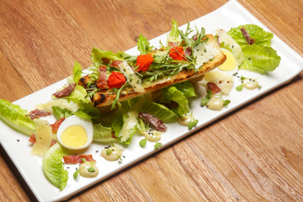 istock Chicken Caesar salad. Exquisite dish. Creative restaurant meal concept. 1199231888