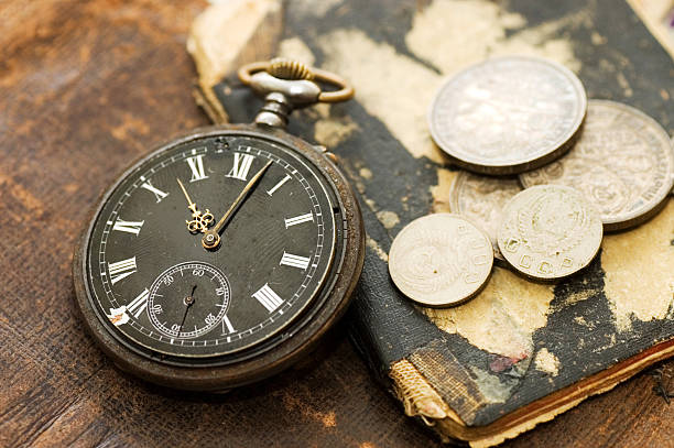 istock book, old watch and money 119923245