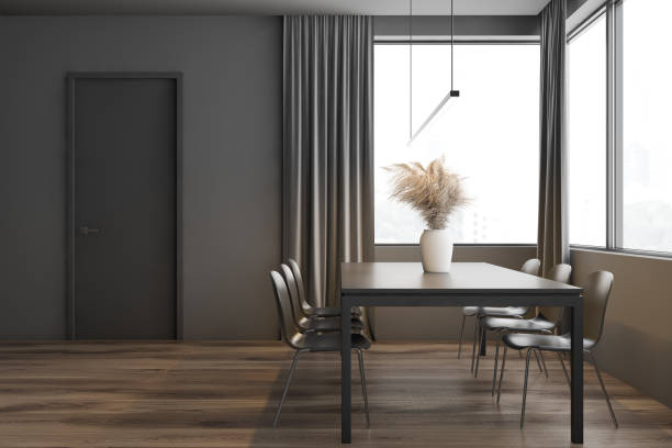 istock Gray dining room interior with door 1199233045