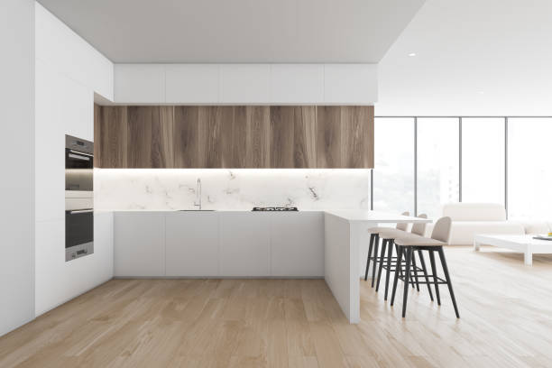 istock White kitchen and living room with bar 1199235102