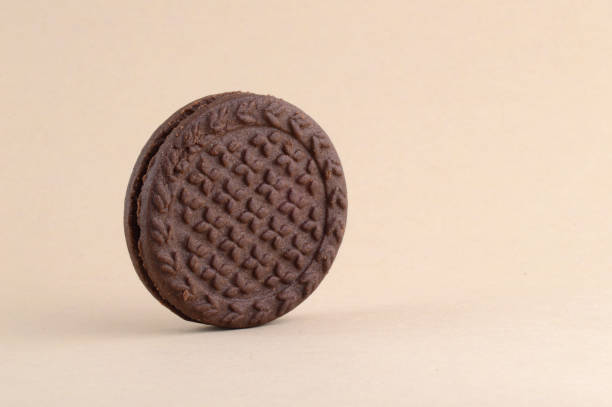 istock brown chocolate sandwich biscuits with cream filling 1199235991