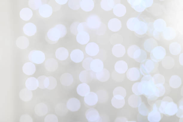 istock Decorative christmas background with bokeh lights and snowflakes 1199239980