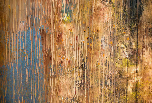 istock drops of paint flowing down the wooden surface 1199241457