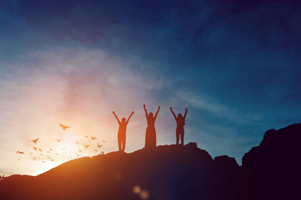 istock Silhouette of team leadership, teamwork and teamwork and delightful silhouette concepts 1199241502