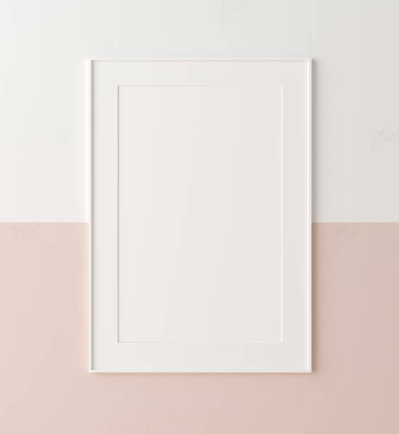 mockup poster frame close-up op muur geschilderd wit en pastel roze kleur - staalplaat stockfoto's en -beelden