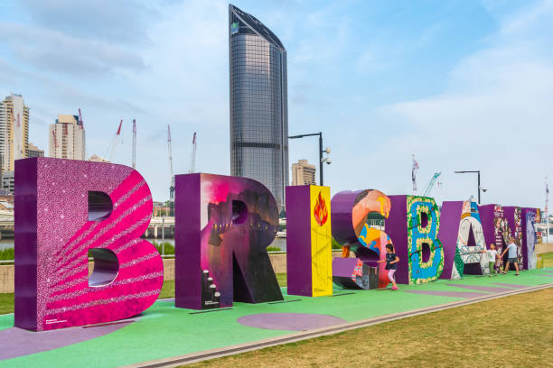 Brisbane, Queensland, Australia - January 9th, 2020 - Letters making Brisbane sign in South Bank Parklands, with modern buildings in the background.