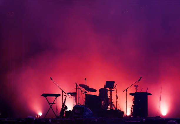 concert stage on rock festival, music instruments silhouettes - musical instrument fotos imagens e fotografias de stock