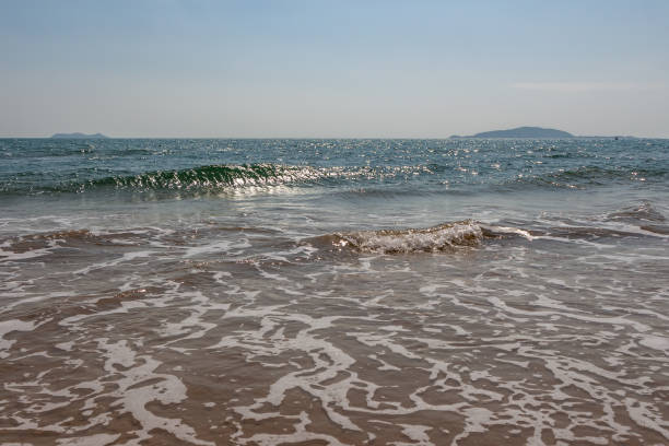 istock Beautiful turquoise sea with sunlight and the waves 1199245966