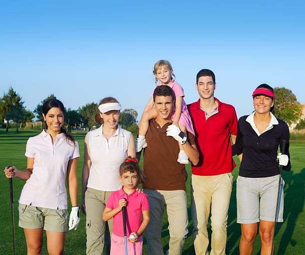 istock Golf course group of friends people with children 119924702