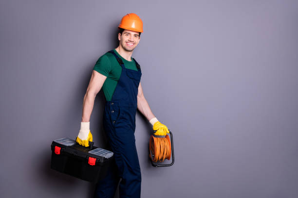 istock Profile side view portrait of his he nice attractive cheerful professional qualified workman walking renovation service carrying instruments isolated over gray pastel color background 1199248127