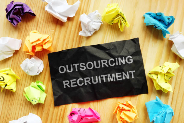 istock Conceptual hand written text showing outsourcing recruitment 1199248885