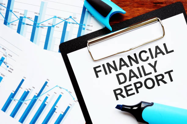 istock Writing note shows the text Financial Daily Report 1199249420