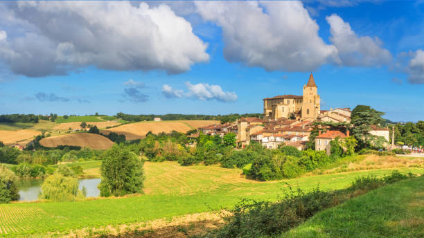 Summer landscape - view of the village of Lavardens, in the historical province Gascony Summer landscape - view of the village of Lavardens, in the historical province Gascony, the region of Occitanie of southwestern France cognac stock pictures, royalty-free photos & images