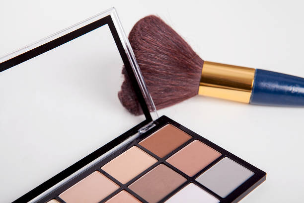 istock Various makeup products,eyeshadow palette on white background. 1199258572
