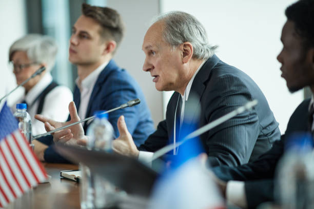 istock Senior business leader at conference 1199258893