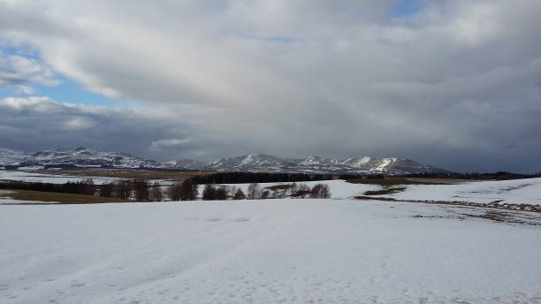 istock Mountainous Scottish landscape scene in winter 1199259042