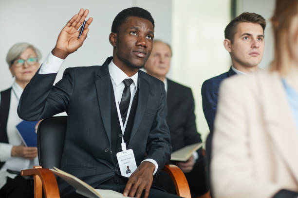 istock Businessman discussing at seminar 1199259773