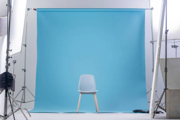 Scandinavian chair style in studio workplace A simple style chair in a blue scene that looks calm and modern. film studio photos stock pictures, royalty-free photos & images