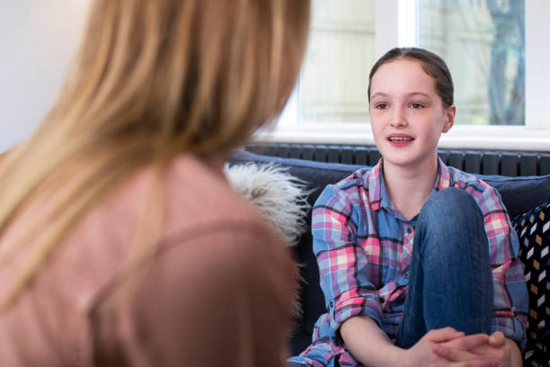 istock Mother Having Serious Conversation With Young Daughter At Home 1199261818