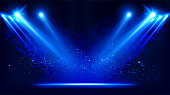 istock Illuminated stage with scenic lights and smoke. Blue vector spotlight with smoke volume light effect on black background. Stadium cloudiness projector. Mist show room. Vector. 1199262115
