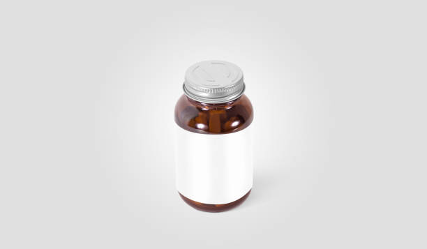 istock Blank amber glass pill can with white label mock up 1199262140