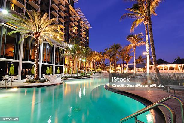 Resort Swimming Pool Stock Photo - Download Image Now - Hotel, Tourist Resort, Building Exterior
