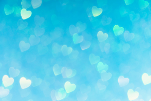 Photo of blue valentines day background with hearts bokeh, love concept wallpaper