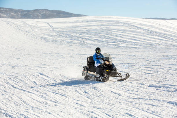 istock Driving snowmobile in Colorado 1199266373