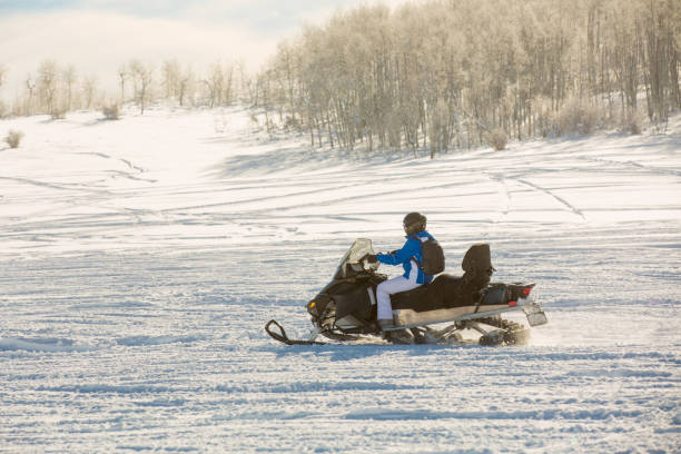 istock Driving snowmobile in Colorado 1199266634