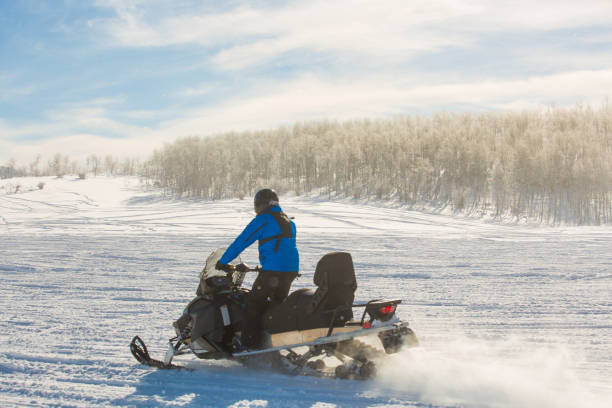 istock Driving snowmobile in Colorado 1199267197
