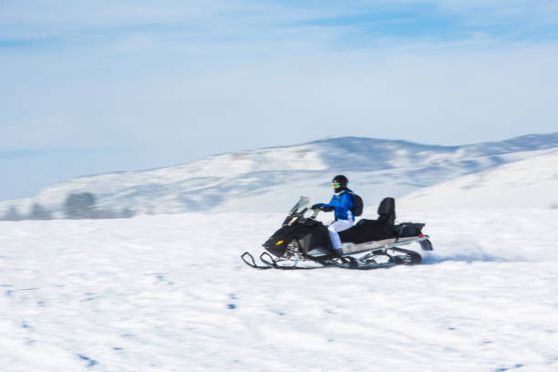 istock Driving snowmobile in Colorado 1199268321