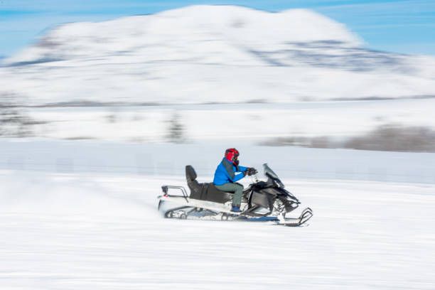 istock Driving snowmobile in Colorado 1199268504