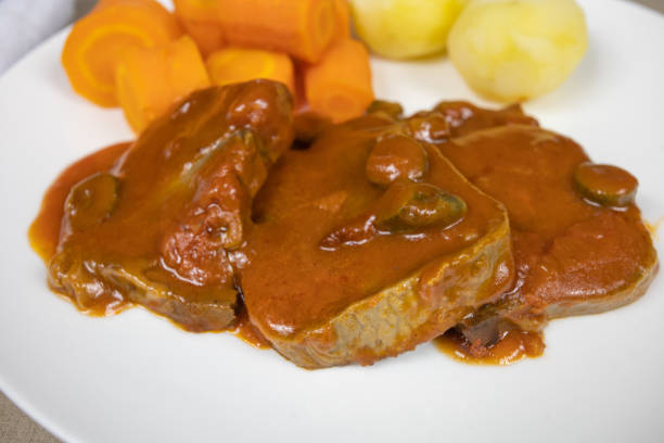 istock tongue with carrot and potato 1199268589