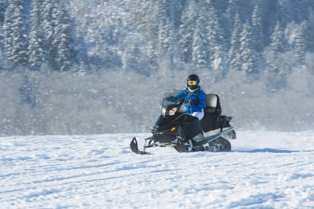 istock Driving snowmobile in Colorado 1199268703